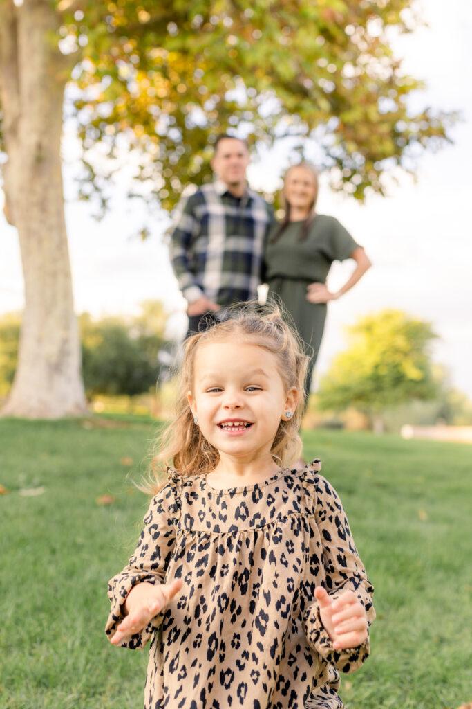 Family of three during fall mini session in Peoria, AZ.