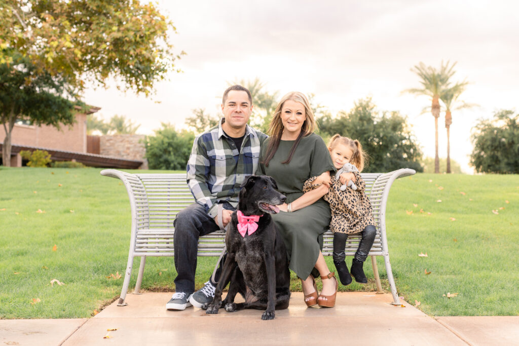 Family of three with dog during fall family mini session in Peoria, AZ.